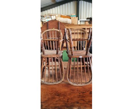 Set of four C19th hoop and stick back dining chairs with solid seats on ring turned supports with stretchers and an elm singl