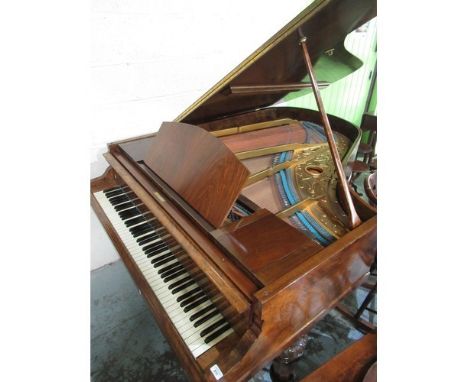 Hagspiel &amp; Comp of Dresden walnut cased baby piano on turned supports 