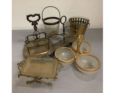 A selection of white metal and gilt centre pieces, wine bottle holders and vintage ice buckets 