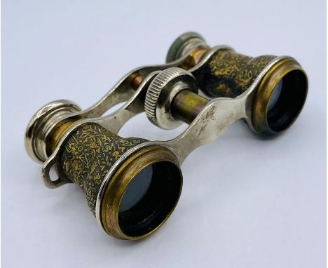 A pair of Vintage Opera glasses with Egyptian decoration. 