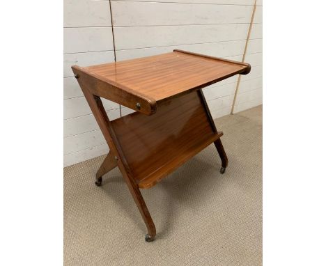 A vintage Italian Carlos Sala 1950's table on castors (H73cm W70cm D52cm)