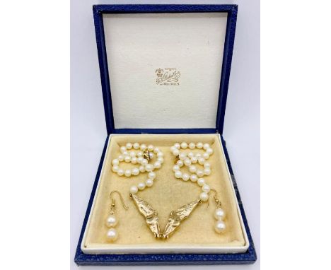 A Pearl necklace with 9 ct gold horse head  pendant on a clasp marked 585. (Approximate weight of horse heads 18g) along with