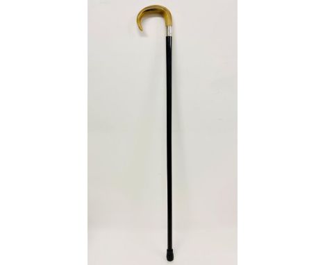 A walking stick with horn handle and hallmarked silver collar