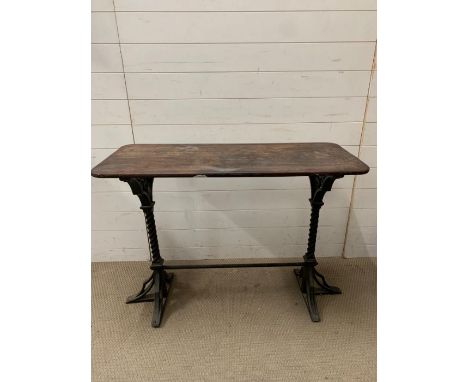 A console table on wrought iron stand base (H78cm W107cm D43cm)