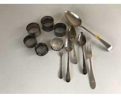 A box of sterling silver - six misc. napkin rings, two silver basting spoons, three teaspoons, pickle fork 