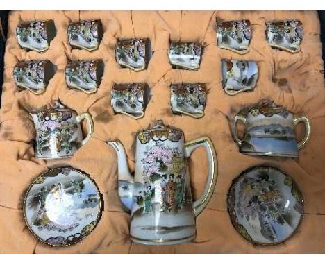 An antique Japanese eggshell tea service in case 