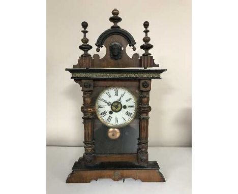 A late nineteenth century continental mahogany mantle clock 