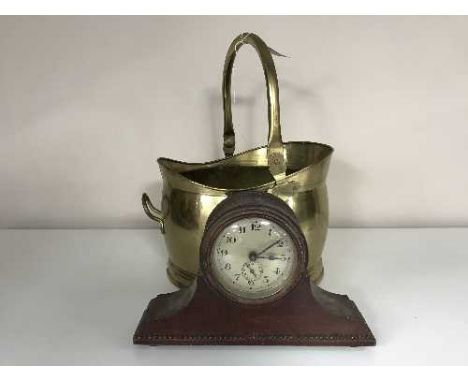 A brass coal bucket together with an early twentieth century mahogany mantle clock
