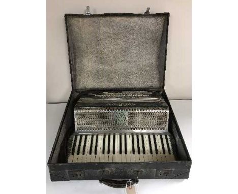 A cased piano accordion by Soprani 