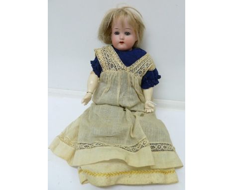 A German bisque-head doll with sleeping eyes, height 36cm