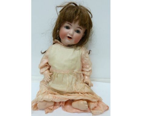 A Simon & Halbig bisque-head child doll, with blue sleeping eyes and eyelashes, 126, with cry mechanism, height 44cm