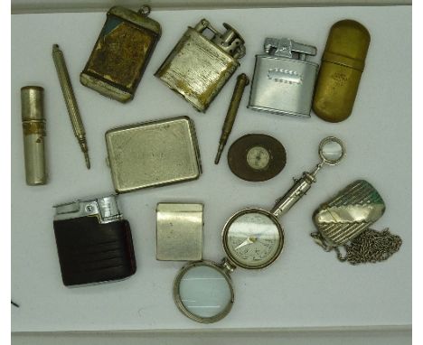Five lighters including Ronson, a novelty compass/eyeglass, three vesta cases, etc.