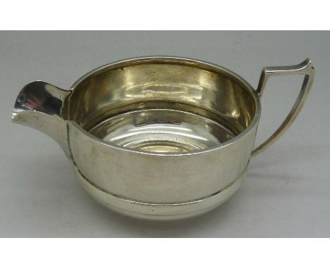 A silver cream jug, Birmingham 1924, William Hutton & Sons, weight 74g