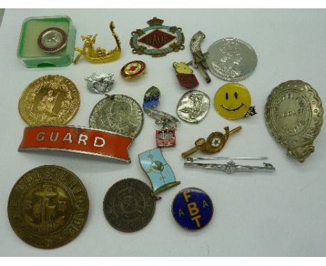 A silver and enamel The United Steel Companies Ltd. 35 years badge, a Daily Express Rupert League badge by Gaunt, lacking pin