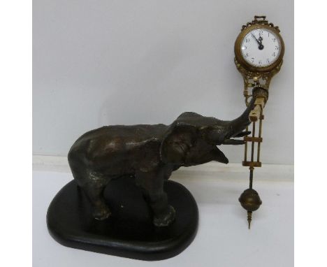 A bronze figure of an elephant with pendulum clock, a/f, length of pendulum 24cm