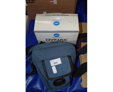 A Canon EOS 3000 with carry bag and a Minolta Dynax 505 SI, boxed