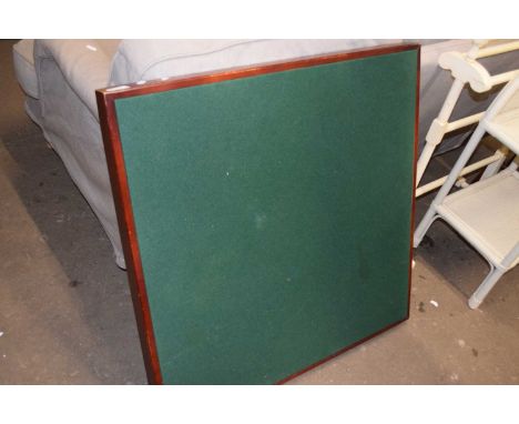 A folding card table