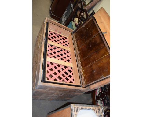 A metal trunk with outer pine shipping case labelled McConnell Calcutta