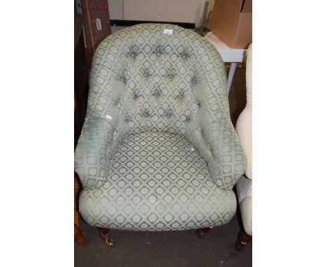A button backed upholstered tub chair