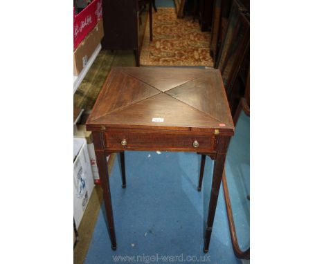 An Edwardian Rosewood and Mahogany Envelope Card Table having four fold over triangular leaves opening to reveal square baize