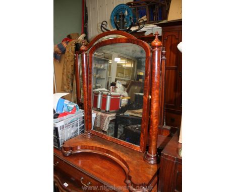 A large Victorian Mahogany Toilet Mirror with arch top mirror on finial topped turned supports, on shaped base with circular 