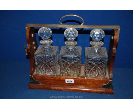 A three Decanter Tantalus with keys
