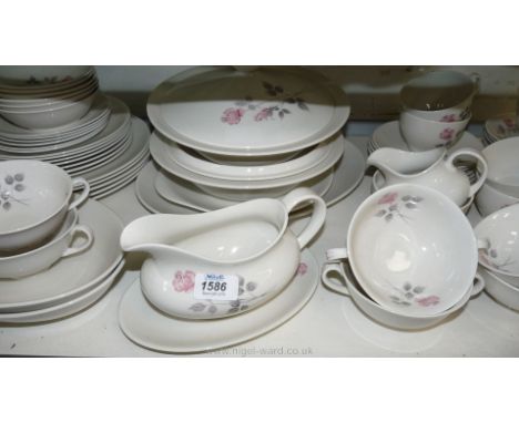 A Royal Doulton 'Pillar Rose' part Tea/Dinner Service including approx twelve dinner plates, eighteen side plates, two servin