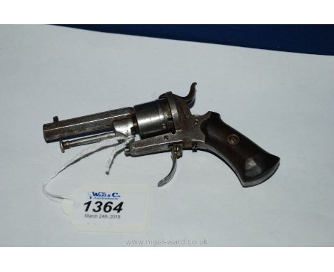 A collectable, compact, 6-shot pin-fire revolver of small (5 mm approx.) calibre having a 52 mm long hexagonal barrel and com
