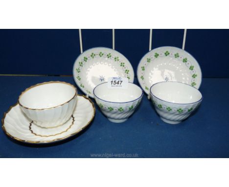 A pair of Caughley Tea bowls and saucers with powder blue line rim, hand-painted in green, blue and pink plus a fine 18th c. 