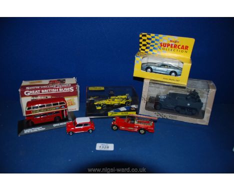 A boxed American half track model, a boxed Aston Martin DB7, a boxed Jordan EJ10 F1 Racing Car, a boxed London Transport RTW 