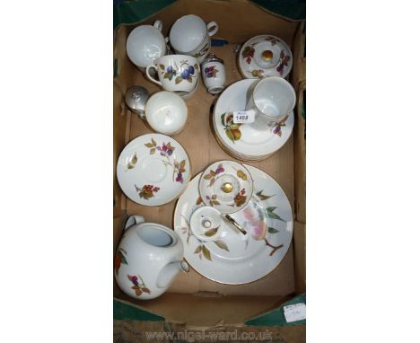 A Royal Worcester 'Evesham' eight place setting Teaset with teapot, coddlers, etc.