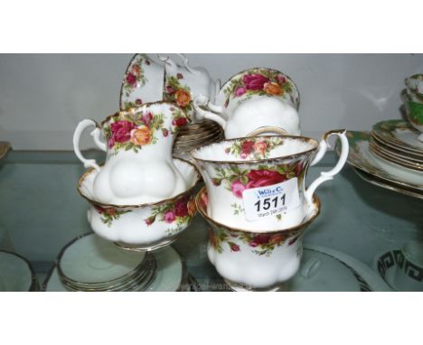 A Royal Albert 'Old Country Roses' pattern part Teaset including five plates, six saucers, six cups, sugar bowl and milk jug