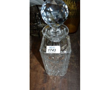 A cut glass Decanter and stopper, numbered 105 (to base of stopper)