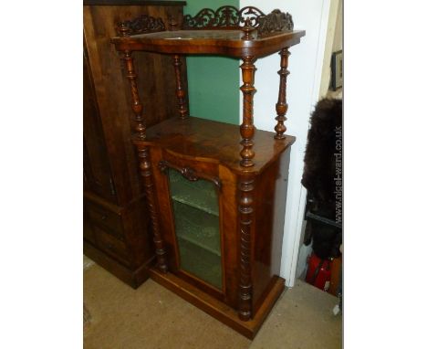 A Fine 19th c. Walnut Chiffonier of small proportions, the glazed Cabinet opening to reveal a green painted and floral stenci