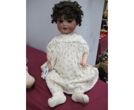 An Early XX Century Bisque Headed Doll, by Armand Marseille, head stamped 996 A.12.M, sleepy eyes, open mouth with teeth, qui