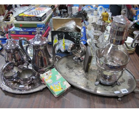 Viners Four Piece Plated Tea Service, on circular tray, claret jug, candelabra, nut bowl, coffee pot on oval twin handled tra