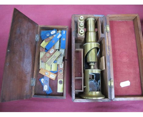 A XIX Century Brass Microscope, with brass slide stamped A.Pritchard, 263 Strand, London, in mahogany box, quantity of slides