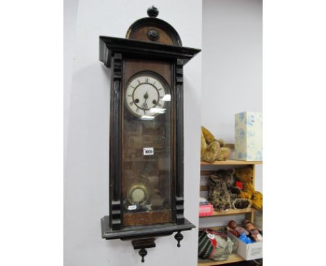 A XIX Century Walnut Vienna Wall Clock, with ebonised decoration, enamel dial, Roman numerals (damaged)
