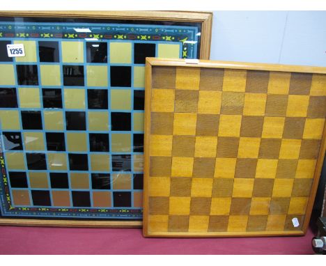 A Hand Painted Glass Chess/Draughts Board, overall width 46.7cm; together with a wooden example, 38.1cm. (2)