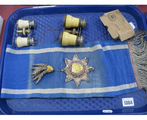 Two Pairs of Opera Glasses and a Commemorative Sash, decorated with textured star shape detail, depicting shield like design,