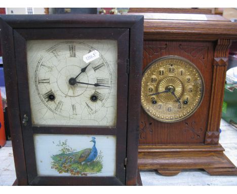 A XIX Century American Ansonia Clock, in a oak case, with a stepped cornice, circular dial; together with one other XIX Centu