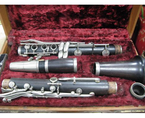 Boosey &amp; Hawkes Four Sectional Clarinet, with plated mounts and Selmer reeds in case.