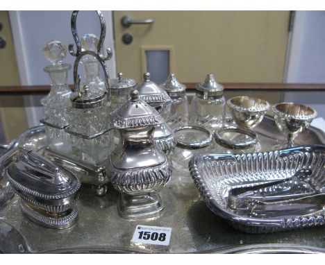 Cruet Stand, plated cruet set, sugar tongs, glass salts, salt and pepper, egg cups, twin handled tray, etc.
