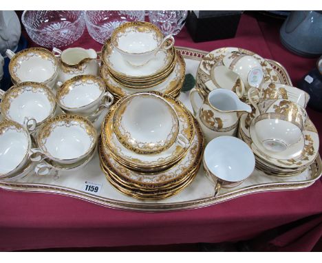 An Early XX Century Hammersley China Tea Service, comprising twelve each plates, tea cups and saucers and milk jug, decorated
