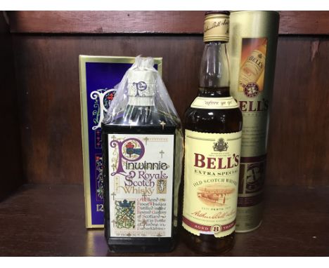 PINWINNIE ROYALE Blended Scotch Whisky 26 2/3 fl. oz, 70° proof, in carton. BELL'S 8 YEARS OLD Blended Scotch Whisky 70cl, 40