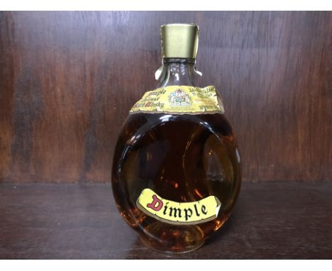 DIMPLE DELUXE Blended Scotch Whisky 26 2/3 fl.oz, 70° proof.