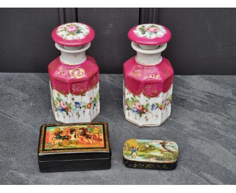 A 19th century papier mache snuff box,&nbsp;the lid decorated with a sporting scene, 7cm wide; together with a Russian papier