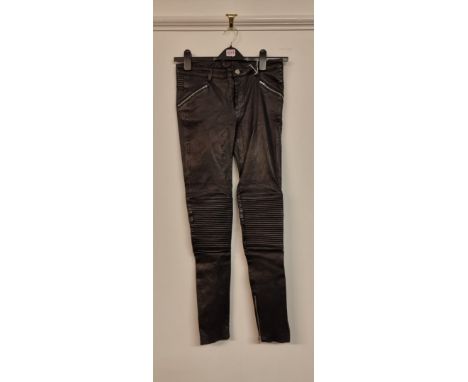 BLK DMN:&nbsp;a pair of black leather skinny trousers with ankle zip, W27 regular (hems loose, rip to interior at waist butto