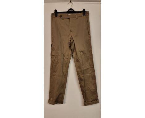 Louis Vuitton:&nbsp;a pair of dark beige cotton trousers, with zip to right leg seam; together with a pair of navy blue chino