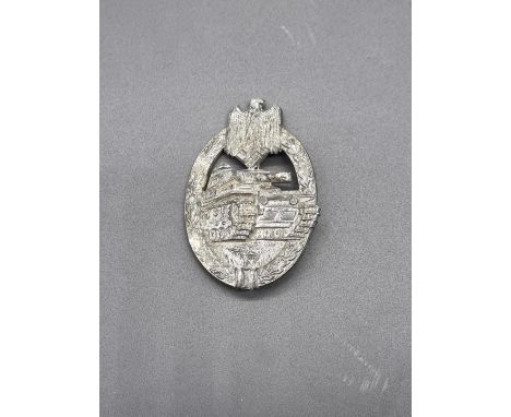A German WWII Panzer Assault badge in silver, by Hermann Aurich, 6cm.